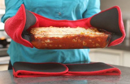 ALL-IN-ONE. Your Cooking Buddy is a terry cloth prep towel, dual pot holder, tool caddy, lid gripper and trivet all-in-one